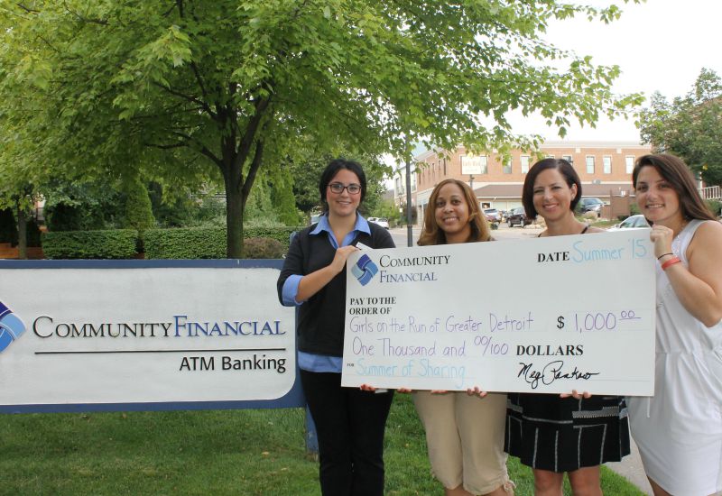 Community Financial donates $1,000 to Girls on the Run!