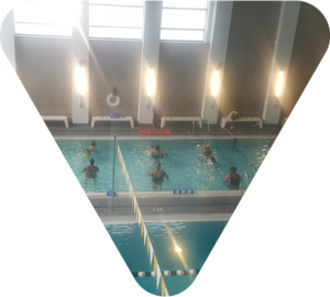 adults swimming at the Boll Family YMCA